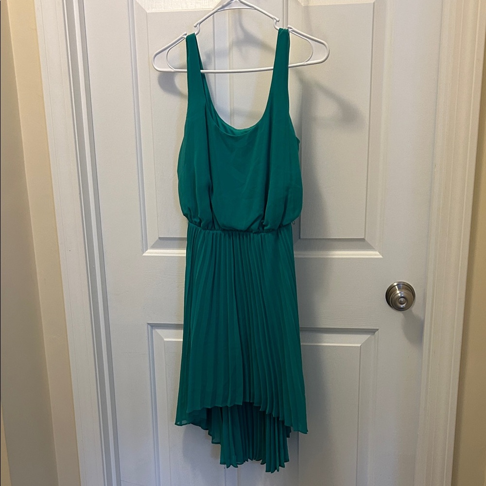 Elegant Bebe Teal Sleeveless Dress